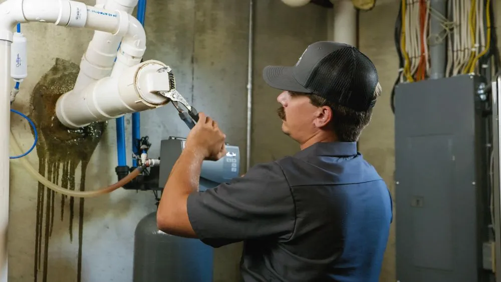 Certified electrician providing panel upgrade in Grand Rapid, MI - Whitney Plumbing Electric Heating & Cooling