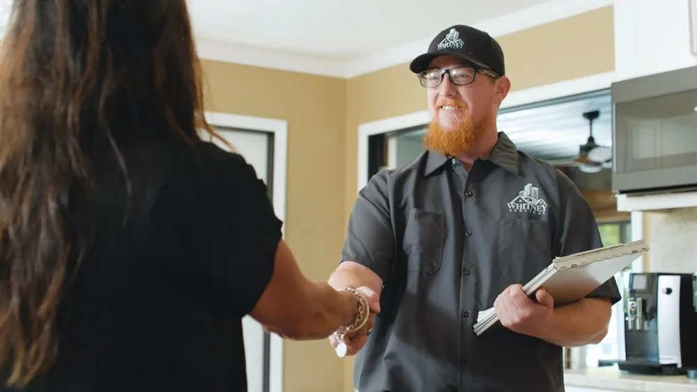 Slide of Whitney Services