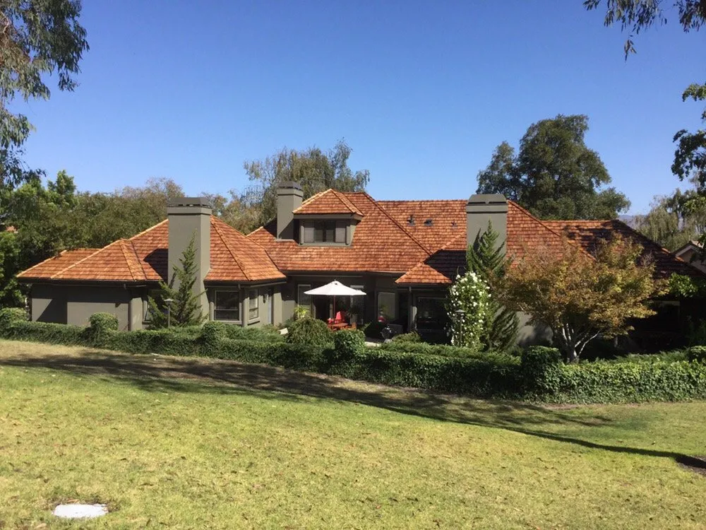 Slide of Wick's Roofing