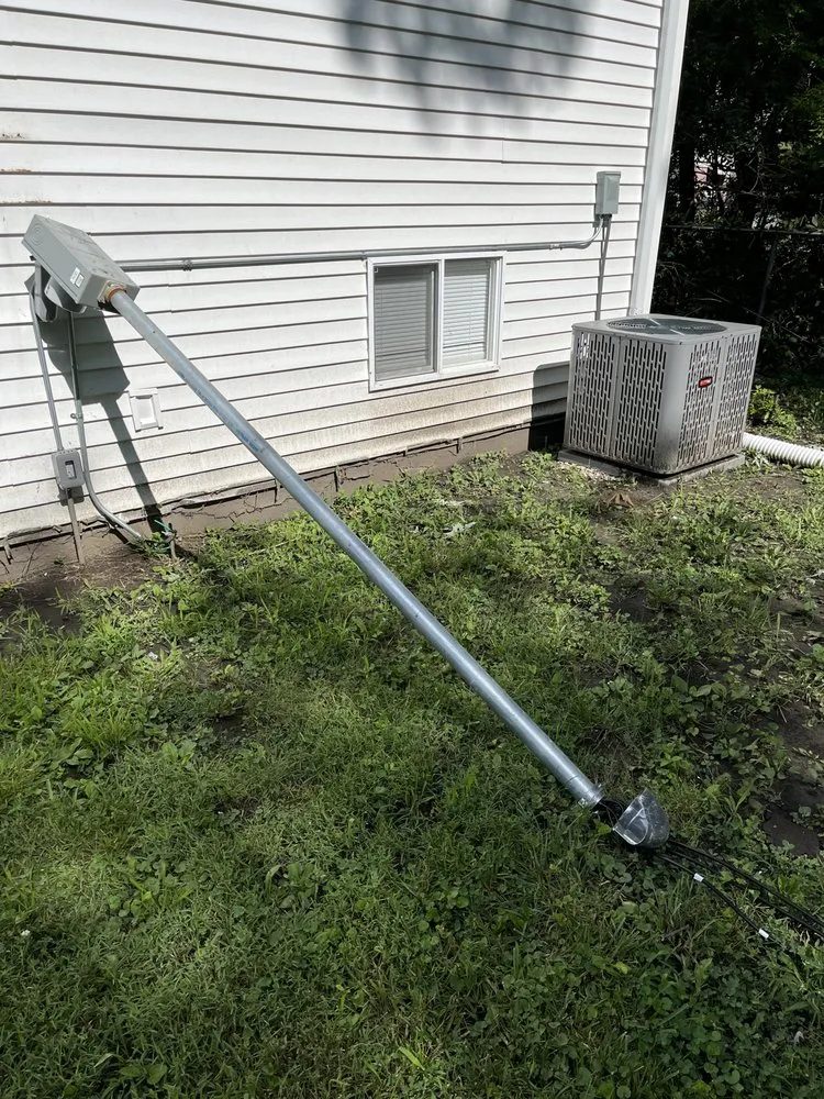 Emergency electrician providing panel upgrade in ,