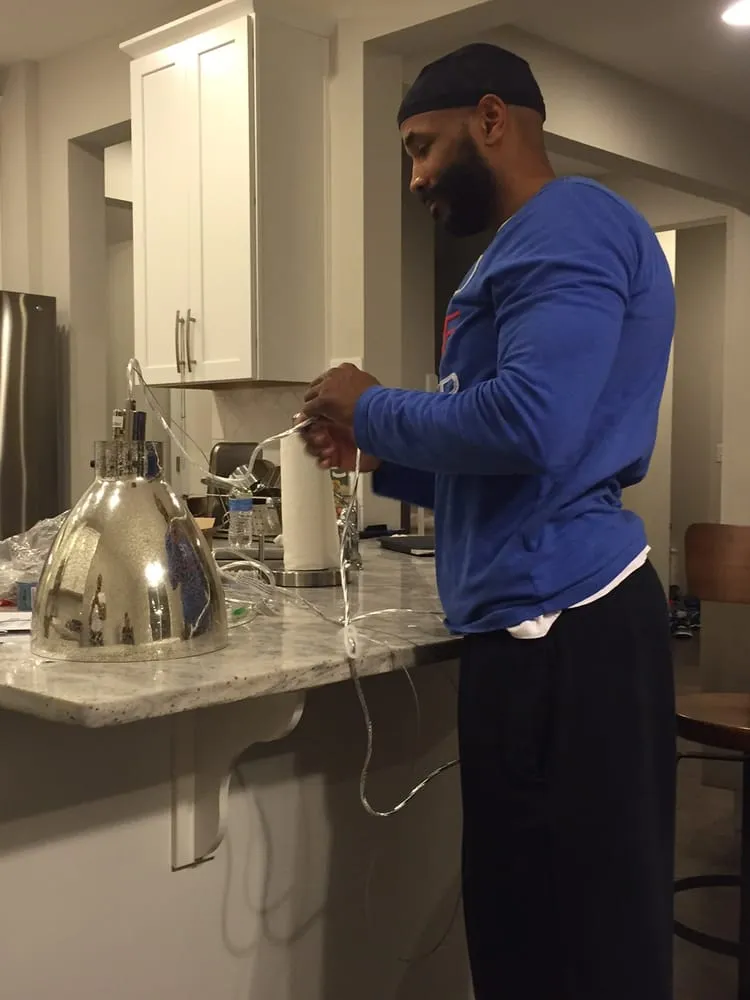 Professional electrician providing lighting installation in , 