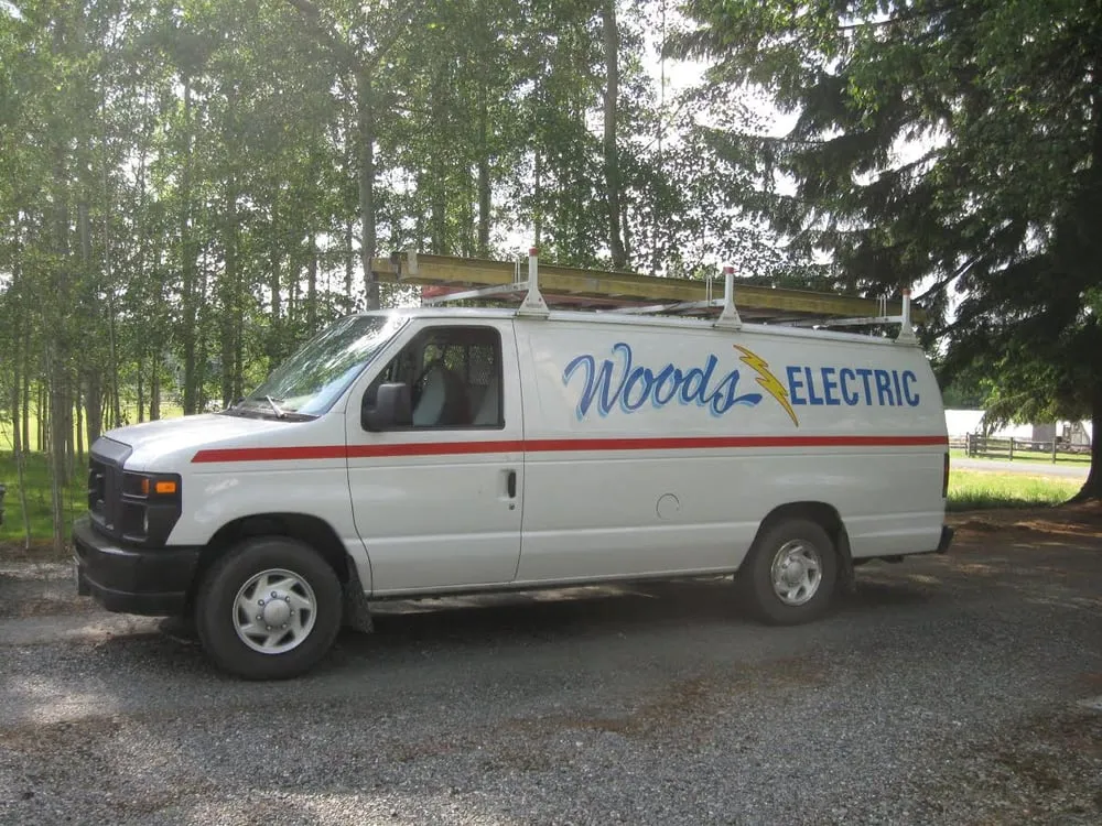 Slide of Woods Electric Inc