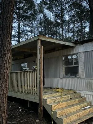 Wreckless Contracting Logo