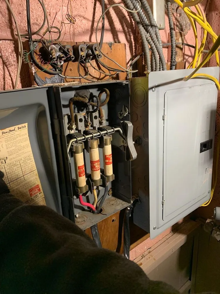 Expert electrician providing panel upgrade in , 