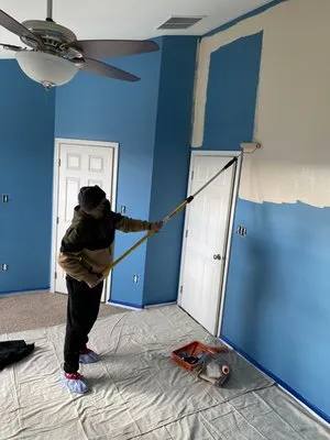 Xquisite Remodeling Logo