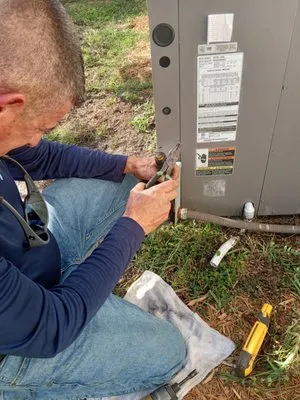 Xtra Mile Cooling, Plumbing & Electric Logo