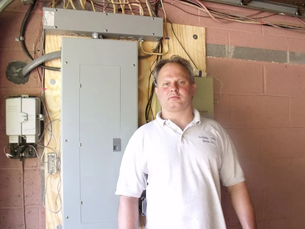 Slide of Yesterday/Today Electric Solar and Carpentry